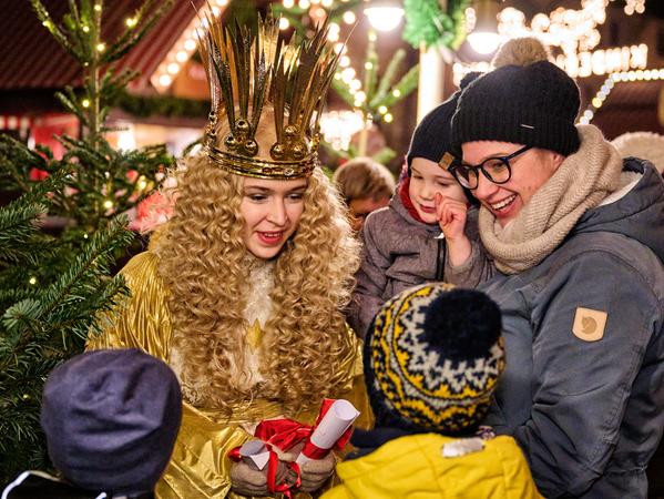 Experience the heartwarming moments at Nuremberg Christkindlesmarkt with the Christkind greeting children. This festive scene at Germany’s legendary Christmas market highlights magical holiday traditions and family-friendly activities in a joyful winter setting