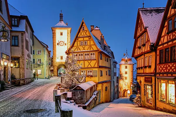 Top 10 Best Child-Friendly Christmas Markets in Germany 33 Discover the iconic Plönlein in Rothenburg ob der Tauber during Christmas. This picturesque winter scene highlights snow-covered half-timbered houses, medieval towers, and sparkling holiday lights, reflecting the fairytale ambiance of Germany’s beloved Christmas market destination.